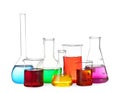 Different laboratory glassware with colorful liquids isolated on white Royalty Free Stock Photo