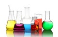 Different laboratory glassware with colorful liquids isolated Royalty Free Stock Photo