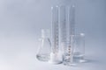 Different laboratory glassware on grey background Royalty Free Stock Photo