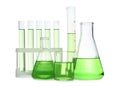 Different laboratory glassware with light green liquid isolated on white Royalty Free Stock Photo