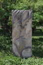 Different leaves carved on a 10 foot limestone slab by artist Susan Falkman at the Boerner Botanical Gardens