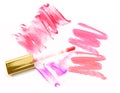 Different lip glosses on white. Royalty Free Stock Photo