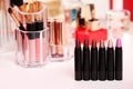 Different lipsticks on dressing table