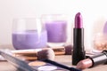 Different lipsticks and other cosmetics on table Royalty Free Stock Photo