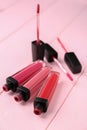 Different liquid lipsticks on table Royalty Free Stock Photo