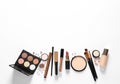 Different luxury makeup products on white background