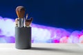 Different make up brushes in container on table Royalty Free Stock Photo