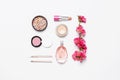 Different makeup cosmetic. Ball blush rouge face powder lipstick concealer bottle of perfume eyeshadow makeup brush spring pink Royalty Free Stock Photo