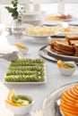 Different meals for breakfast on white table indoors. Buffet service Royalty Free Stock Photo