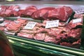 Different meats and sausages on a meat counter Royalty Free Stock Photo