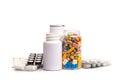 Different medical bottles and tablets isolated on white Royalty Free Stock Photo