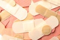 Different medical sticking plasters as background, closeup