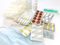 Different medicines: tablets, pills in blister pack, medications drugs, medical gloves, mask, syringe, thermometer, spray, Royalty Free Stock Photo