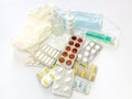 Different medicines: tablets, pills in blister pack, medications drugs, medical gloves, mask, syringe, thermometer, spray, Royalty Free Stock Photo