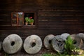 Different millstones in village Royalty Free Stock Photo