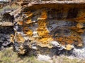 the Different minerals color the rock, the landscape in Antsirabe, the wild nature of Madagascar