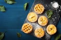 Different mini apple pies top view. Autumn pastry desserts.