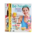 Different modern printed magazines on white Royalty Free Stock Photo