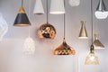 Different modern streamlined mirror copper chandeliers. Bubble metal copper shade pendant