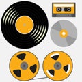Different music records: vinyl, audio cassette, compact disk, reel to reel tape Royalty Free Stock Photo