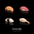 Different Nigiri sashimi sushi set pieces isolated on black background ready food banner with text space Royalty Free Stock Photo