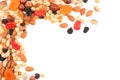 Different nuts, dried fruits and berries on white background, top view Royalty Free Stock Photo