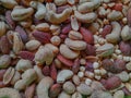 different nuts in a heap. mixed nuts background