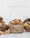 Different nuts in a plate closeup Royalty Free Stock Photo