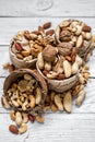 Different nuts in a plate closeup Royalty Free Stock Photo