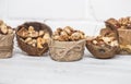 Different nuts in a plate closeup Royalty Free Stock Photo