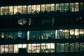 Different office floors reality in the same building at night Royalty Free Stock Photo