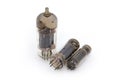 Different old vacuum tubes on a white background