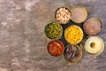 Different open canned food on old wooden background. Top view. Flat lay Royalty Free Stock Photo