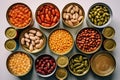 Different open canned food on old wooden background. Top view. Flat lay. Generative AI technology Royalty Free Stock Photo