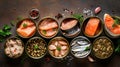 Different open tin cans with canned fish among spices and herbs on a brown background, canned salmon and mackerel, sprat