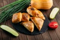 Different oriental baked pie with meat samsa