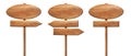 Different oval wooden direction arrow signposts or roadsigns made of natural wood