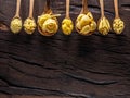 Different pasta types in wooden spoons on the table. Top view.