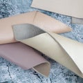 Natural leather textures samples on grey stone background Royalty Free Stock Photo