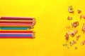 Different pencils on color background. School stationery