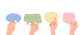 Different people hands holding speech bubbles. Illustration in flat style Royalty Free Stock Photo
