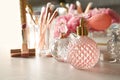 Different perfume bottles on dressing table,  for text Royalty Free Stock Photo