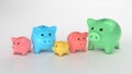 Different piggy banks. Colored piggy banks of different sizes and colors for different budget. 3d render