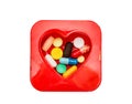 Different pills in box heart Royalty Free Stock Photo