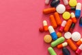 Different pills on color background Royalty Free Stock Photo