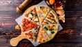 Different pizza slices on a wooden table mix Royalty Free Stock Photo