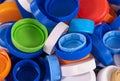 Different plastic bottle caps as a background. Top view Royalty Free Stock Photo