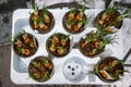 Different potted plants, seedlings, sprouts, flowers selling on the street in springtime, Essen, Germany. Gardening