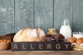 Different products on wooden background. Food allergy