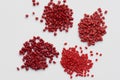 Different red plastic resins with processed comb Royalty Free Stock Photo